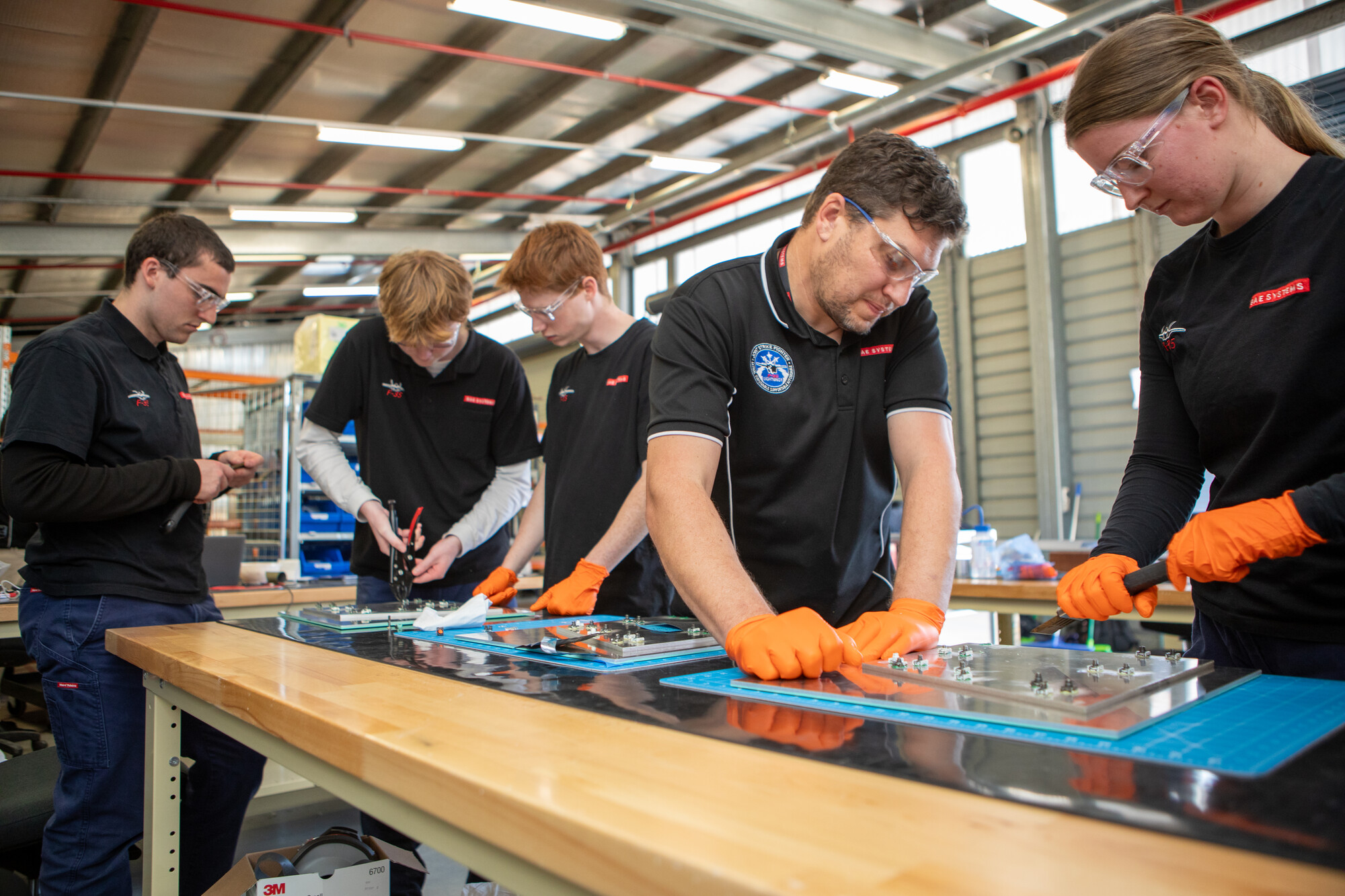Group of aircraft workers at F-35 Skills Development Centre at Williamtown, NSW