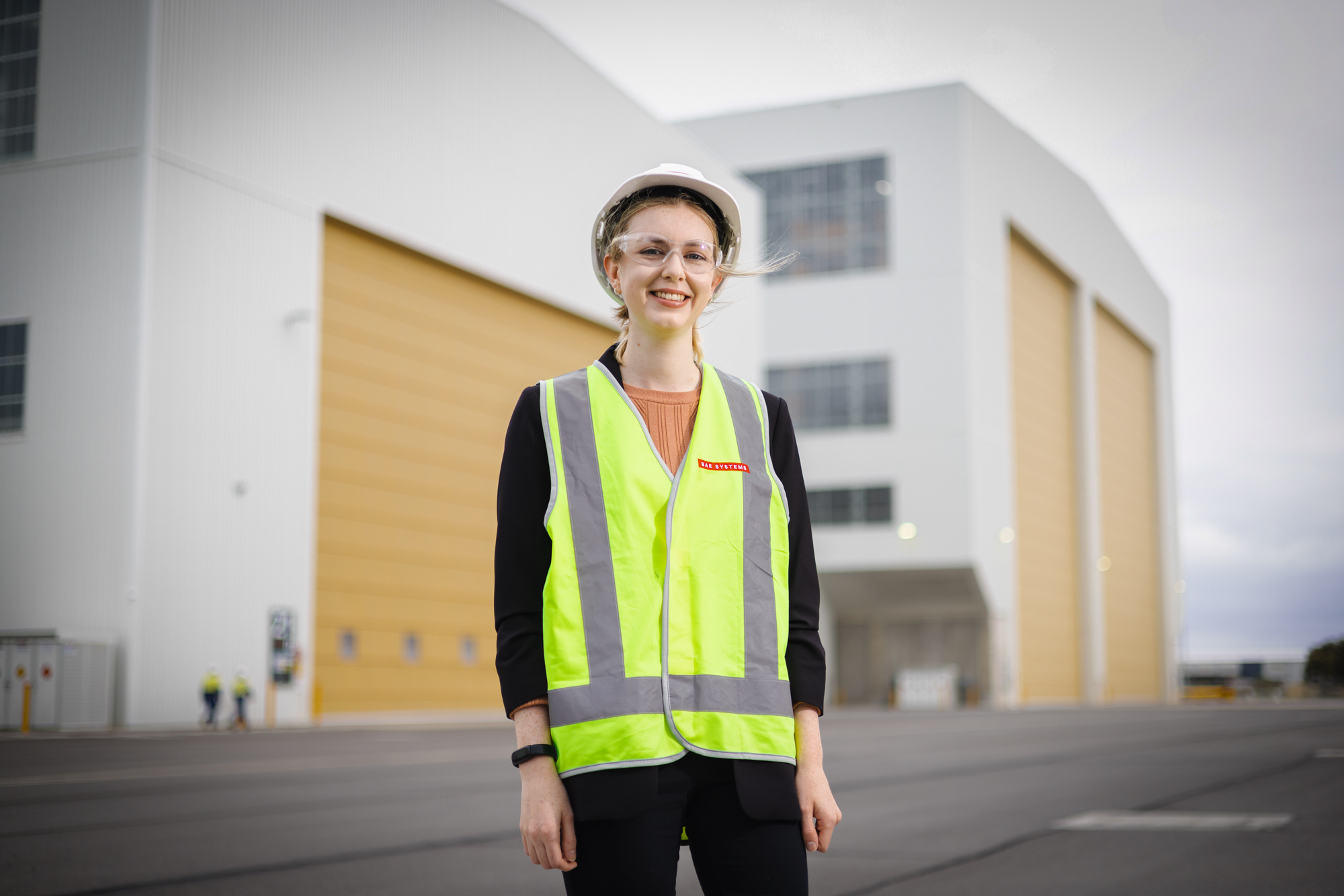 Young woman and man dressed in formal businesswear