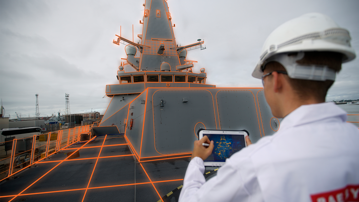 A systems engineer at BAE Systems working on designs for a naval ship