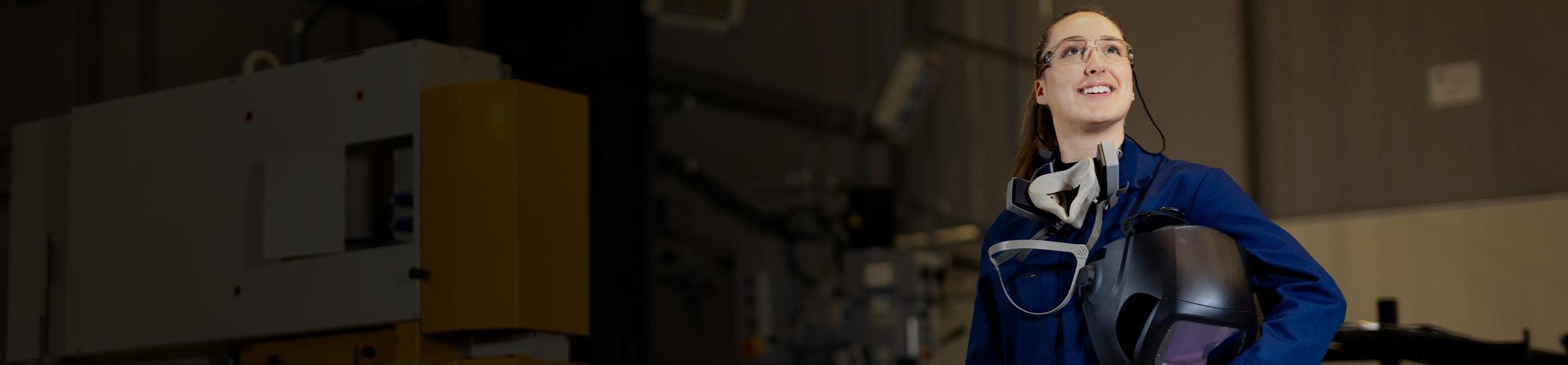 Female employee looking upwards