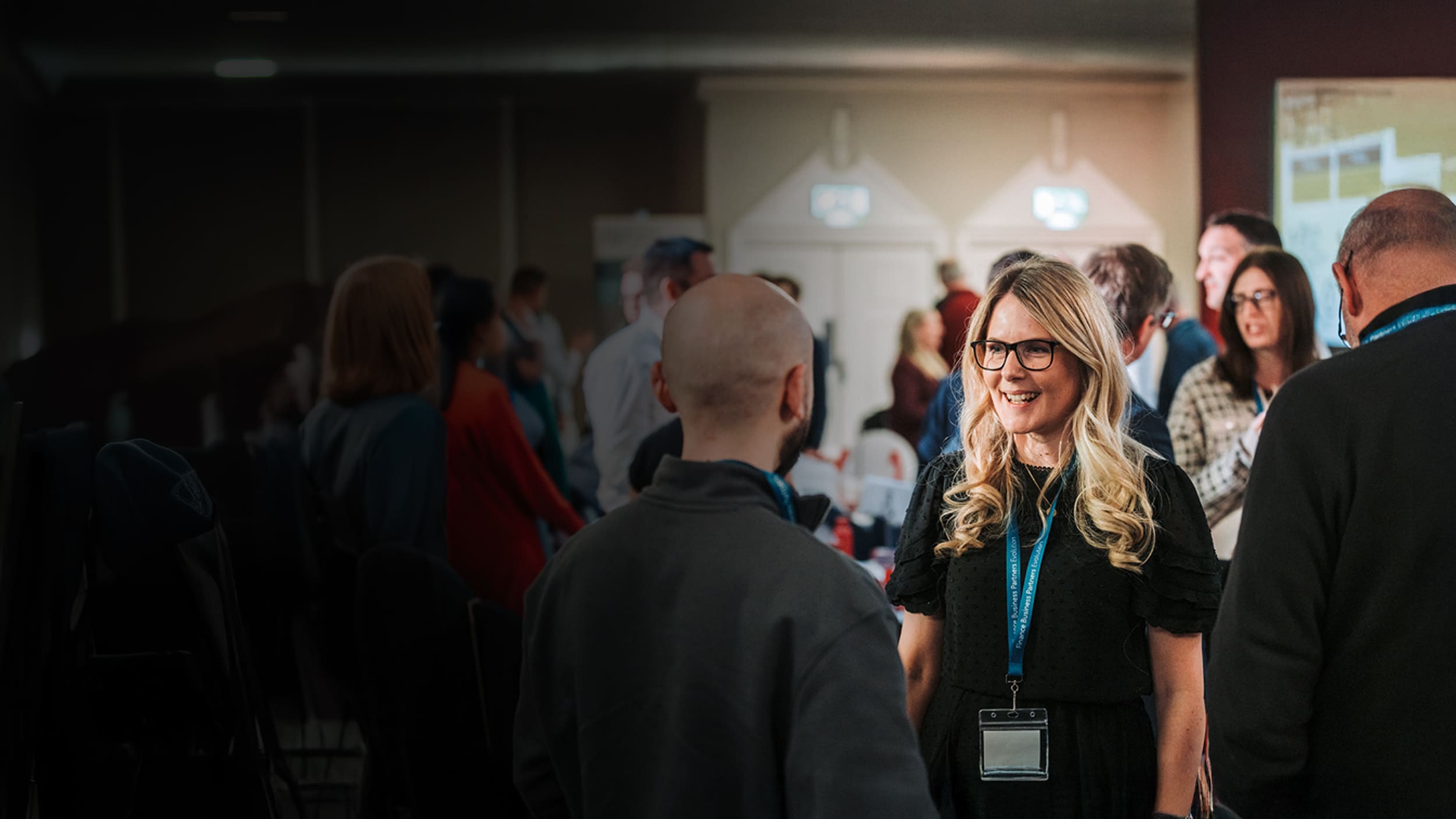 Employees networking at event