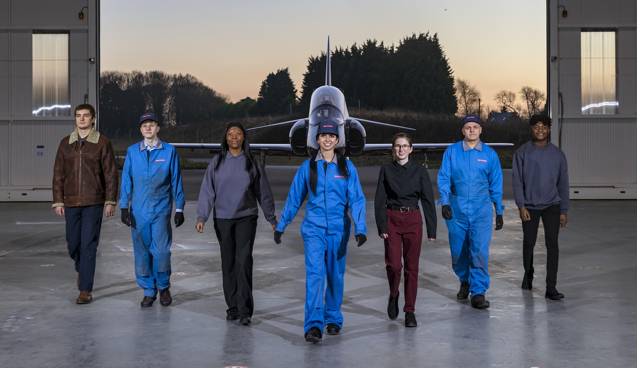 BAE Systems employees walking in front of Hawk