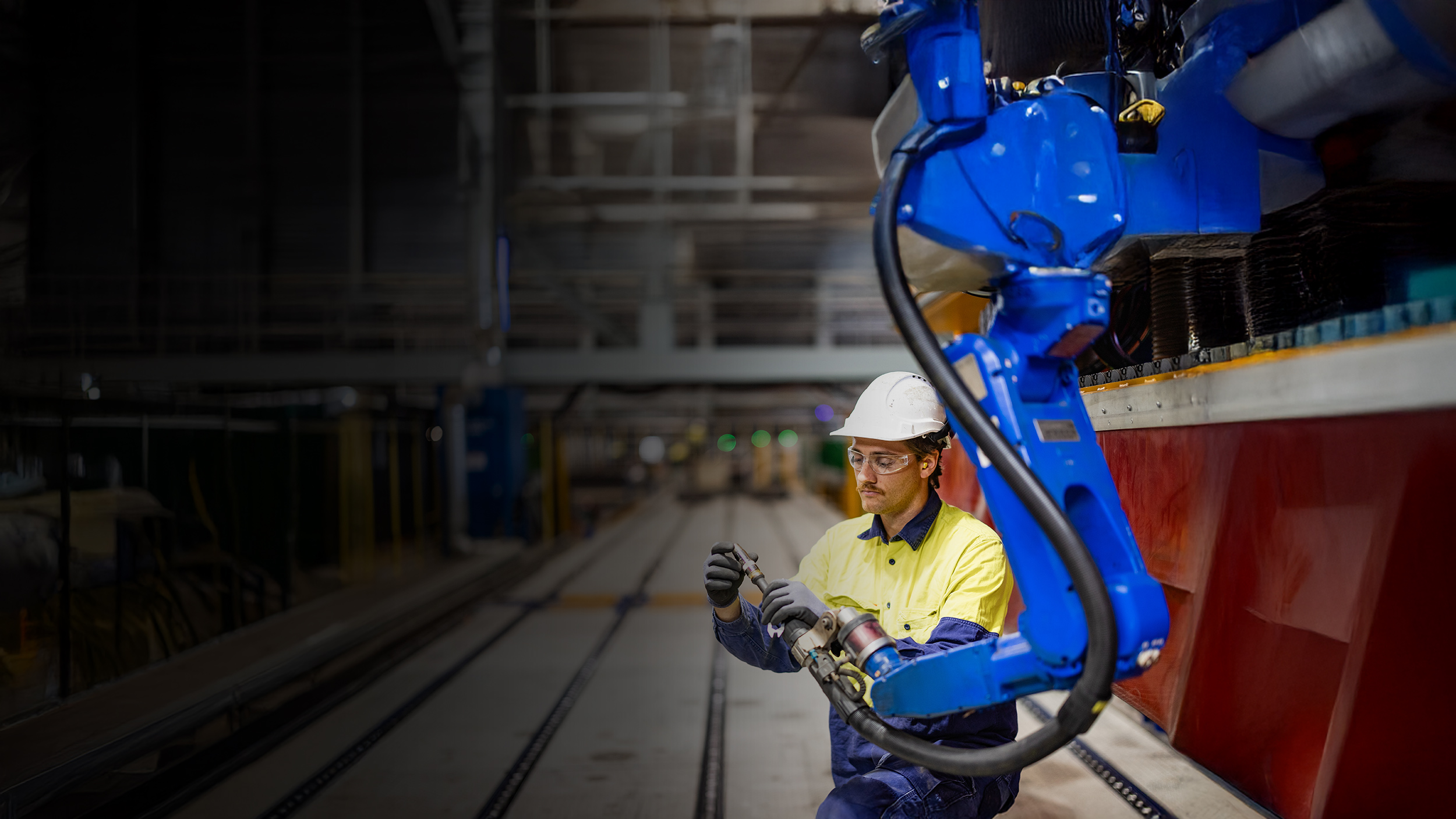 man using machine arm